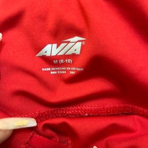 Red legging really stretchy are a size medium but do fit pretty tightly